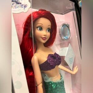 Disney Ariel Doll with clip on pendant.